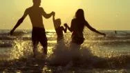 Happy Family With A Child At The Beach Stock Footage