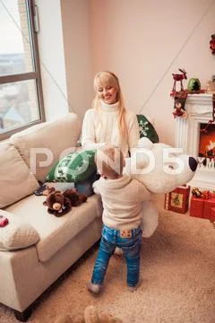Happy family at christmas time Stock Photos