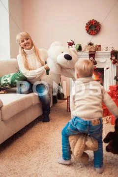 Happy family at christmas time Stock Photos