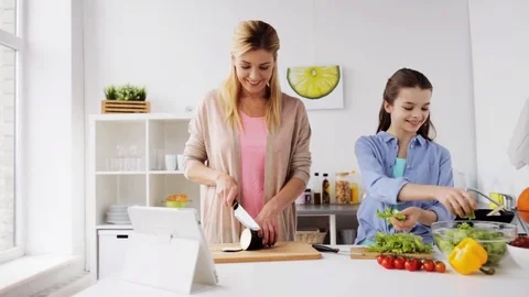 Happy family cooking dinner at home kitchen Stock Footage