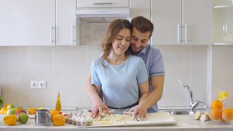 Happy Family is Cooking in The Kitchen. Slow motion Stock Footage