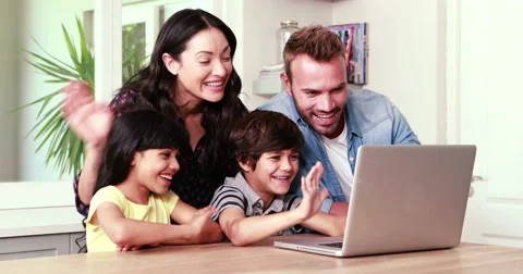 Happy family doing video chat on laptop Stock Footage