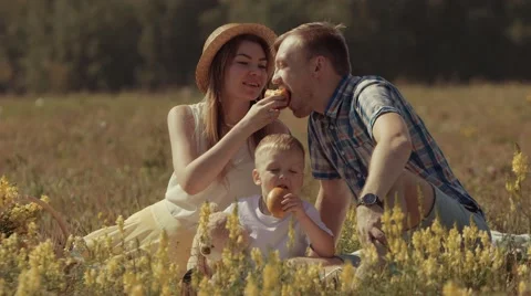 Happy family enjoying their weekend in nature Stock Footage