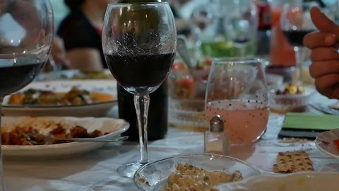 Happy family gathering, sharing food Stock Footage