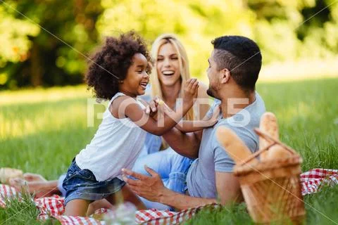Happy family having fun time on picnic Stock-Fotos