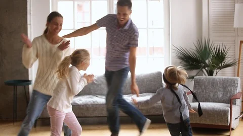 Happy family kids playing hide and clap game at home Stock Footage