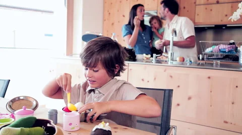 Happy family in kitchen preparing dinner in vacation Stock Footage 54095420
