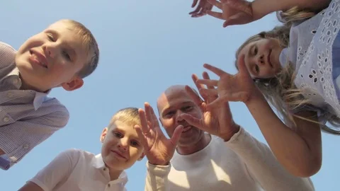 Happy family looking at the camera Stock Footage 82199758