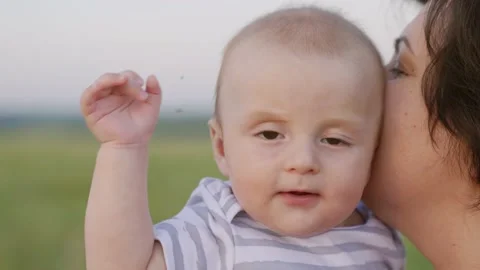Happy family, mom and baby hugs, walk Stock Video Pond5