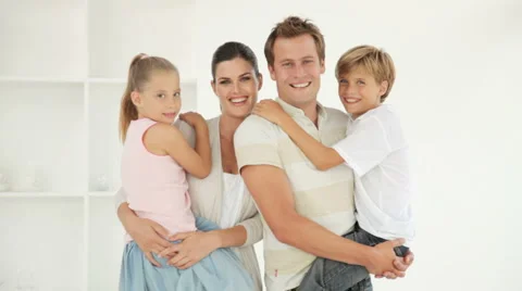 Happy Family Posing For Camera Stock Footage 921677