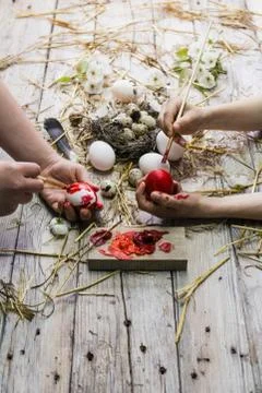 Happy family preparing for Easter Stock Photos
