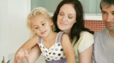 Happy Family in their Kitchen Stock Footage