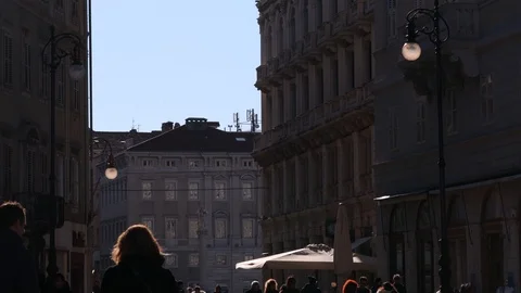 Happy Family walking in Trieste between Shopping People in Trieste Stock Footage 127504341