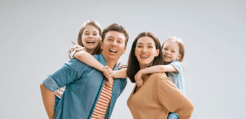 Happy family on white background. Stock Photos