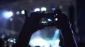 Happy fan shooting video at music concert, enjoying favorite band performance HD Footage