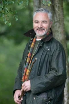 Happy farmer in the field 写真素材