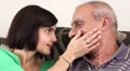 Happy father and daughter hugging , looking at camera HD Footage