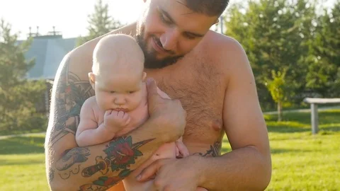 Happy father having fun throws up in the air child at sunset, family, travel Stock Footage 78698822