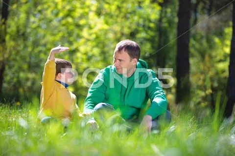 Happy father with his little son outdoors Stock Photos