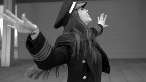 Happy Female Captain Pilot Dancing Cheerful at Airport Stock Footage 87713787