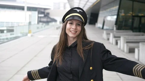 Happy Female Captain Pilot Dancing Cheerful at Airport Stock-Footage 87714876