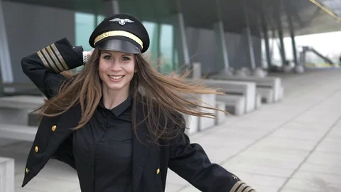 Happy Female Captain Pilot Dancing Cheerful at Airport Stock Footage 87715294