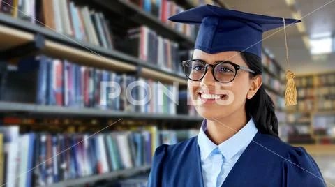 Happy female graduate student in mortarboard Stock Photos