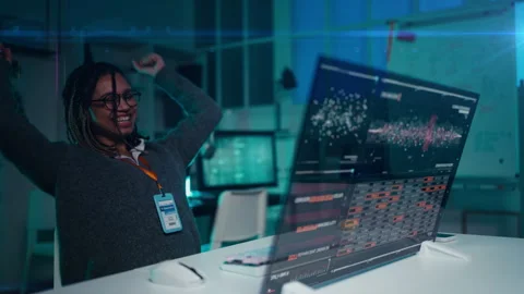 Happy female programmer fixing malfunction on dynamic holographic screen Stock Footage 333195415