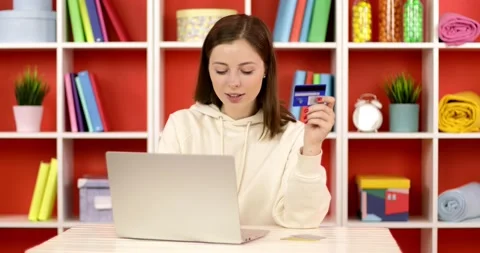 Happy female shopper using instant easy mobile payments Stock Footage 158704235