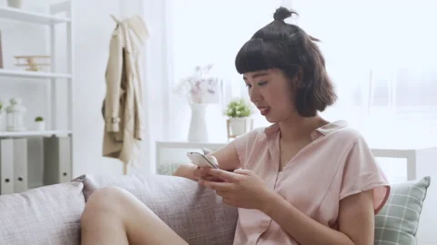 Happy female using cellphone having fun relax. Stock Footage 133471654