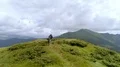The happy four people dancing on the mountain top 4k or 4k+ Resolution