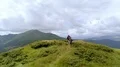 The happy four people dancing on a mountain top 4k or 4k+ Resolution