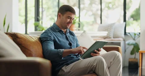 Happy, freelancer and man with tablet, lounge and copywriting on social media, Stock Footage 329341622