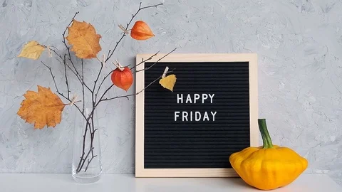 Happy Friday text on letter board and bouquet of branches with yellow leaves Stock Footage 114212601