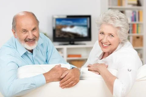 Happy friendly elderly couple Stock Photos