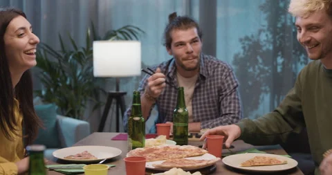 Happy friends having dinner together Stock Footage 297780670