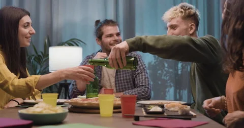 Happy friends having dinner together Stock Footage 297780730