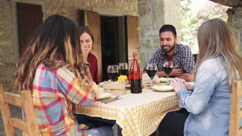 Happy friends having fun drinking red wine out side at farm house bar - Young pe Stock Footage 237454208
