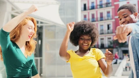 Happy friends multicultural dancing together in the street Vídeos de archivo 236423754