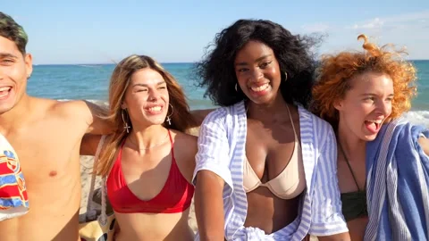 Happy friends taking selfie on beach Stock Footage 310185477