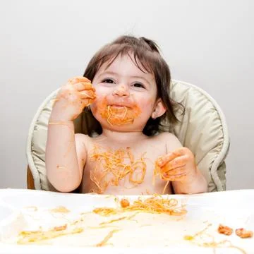 Happy fun messy eater Stock Photos