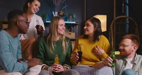 Happy fun smiling multiethnic young student friends enjoy drinks celebrating Stock Footage 171170921