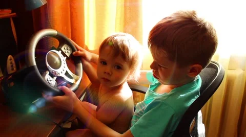 Happy funny children playing a computer game Vídeo Stock 62429972