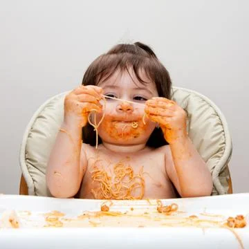 Happy funny messy eater Stock Photos