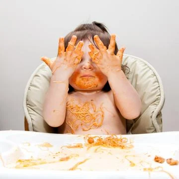 Happy funny messy eater Stock Photos