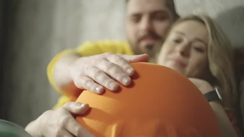 Happy future parents are stroking their bellies. Big belly. Video stock 231207609