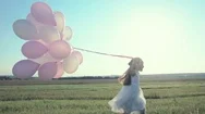 Happy Girl With Balloons Stock Footage