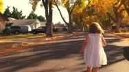 Happy Girl Child White Dress Running Away Pov Autumn City Street Slow Motion Stock Footage