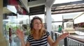 Happy Girl Dancing while Listening Music with Headphones Outdoors. HD Footage