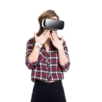 Happy girl getting experience using VR headset glasses of virtual reality, much 写真素材